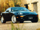 [thumbnail of Aston Martin - DB7 - rfront - black=awm.jpg]